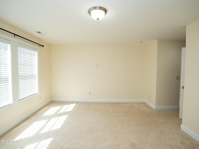 4137 Strendal Dr, Cary, NC 27519 - empty room featuring baseboards, light colored carpet, and visible vents