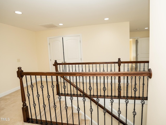 4137 Strendal Dr, Cary, NC 27519 - hallway featuring carpet floors, visible vents, baseboards, recessed lighting, and an upstairs landing