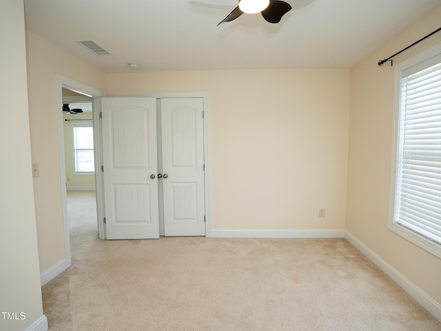 4137 Strendal Dr, Cary, NC 27519 - spare room featuring baseboards, carpet, a ceiling fan, and visible vents