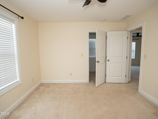 4137 Strendal Dr, Cary, NC 27519 - unfurnished bedroom with baseboards, visible vents, and light colored carpet