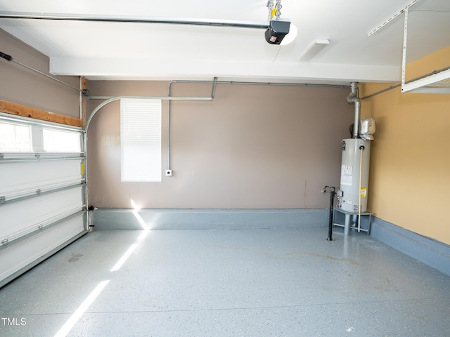 4137 Strendal Dr, Cary, NC 27519 - garage featuring a garage door opener and gas water heater