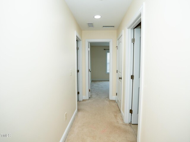 4137 Strendal Dr, Cary, NC 27519 - hall with baseboards, light carpet, and visible vents