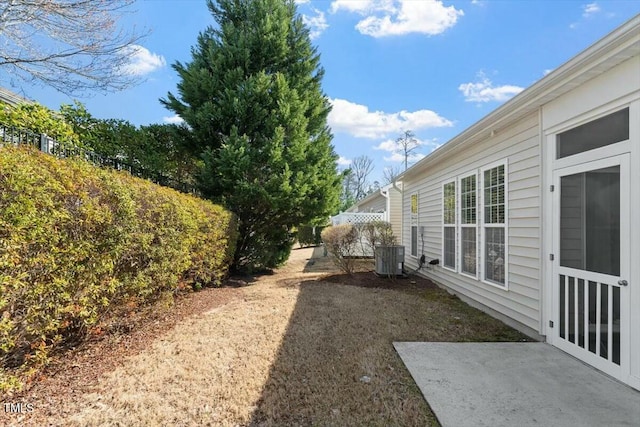 view of yard featuring central AC