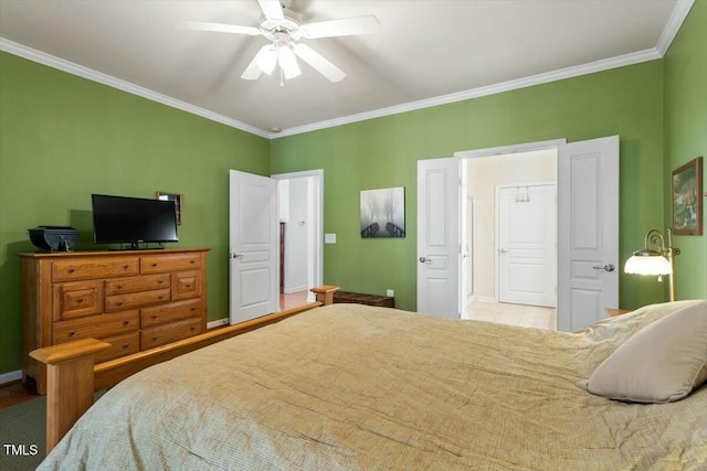 bedroom featuring baseboards, ceiling fan, and ornamental molding