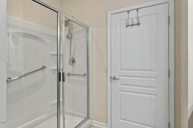 full bathroom with a stall shower