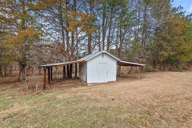 view of shed featuring a carport