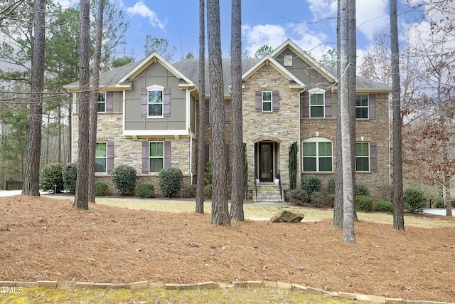 view of front facade featuring stone siding