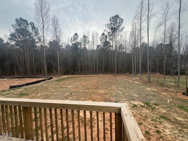 view of yard with a wooded view