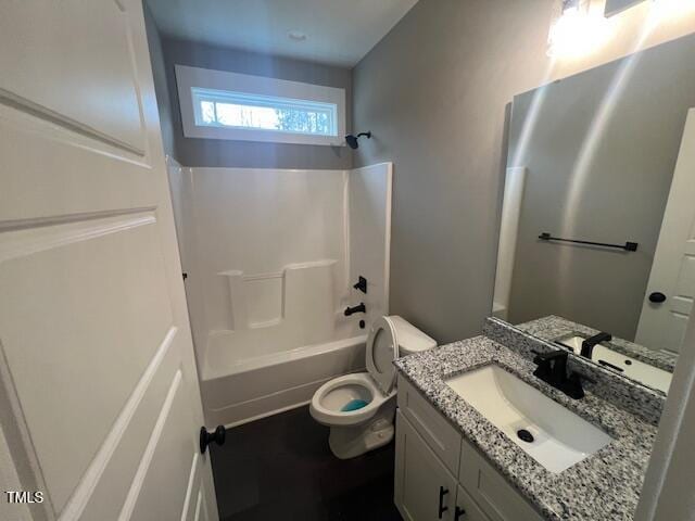 full bath with shower / bathtub combination, toilet, and vanity