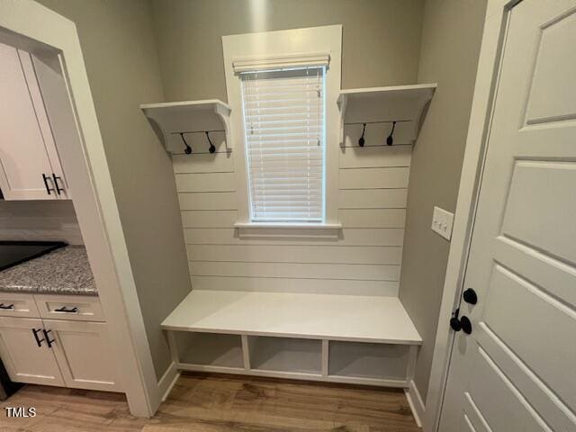 mudroom with wood finished floors