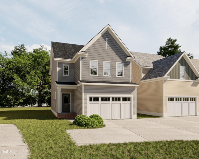 traditional home with a garage, driveway, and a front lawn