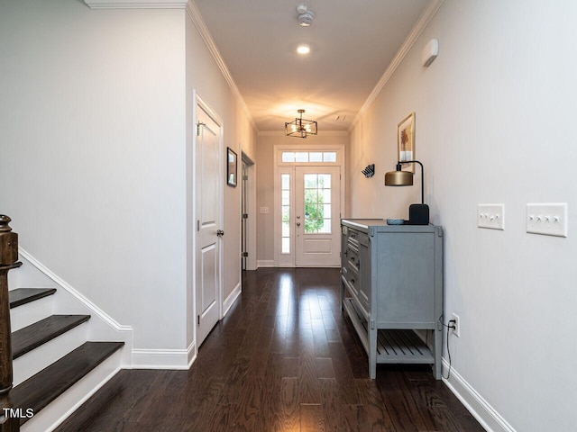 entryway featuring dark wood-style floors, crown molding, stairs, and baseboards