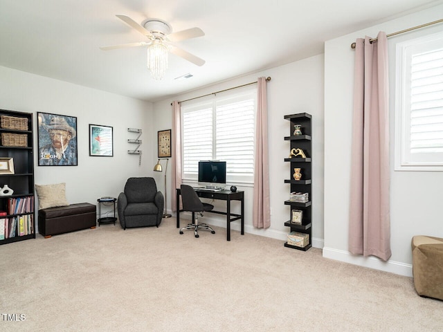 office with baseboards, ceiling fan, visible vents, and carpet flooring