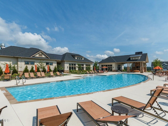 community pool with a patio