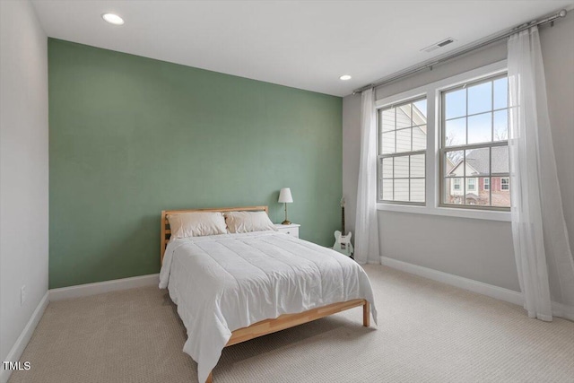 bedroom featuring carpet floors, baseboards, and recessed lighting