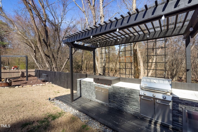 view of patio featuring area for grilling, grilling area, and a fenced backyard