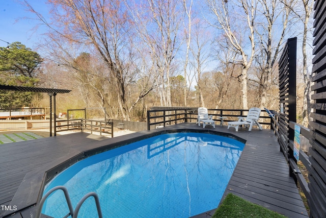 view of pool featuring a wooden deck