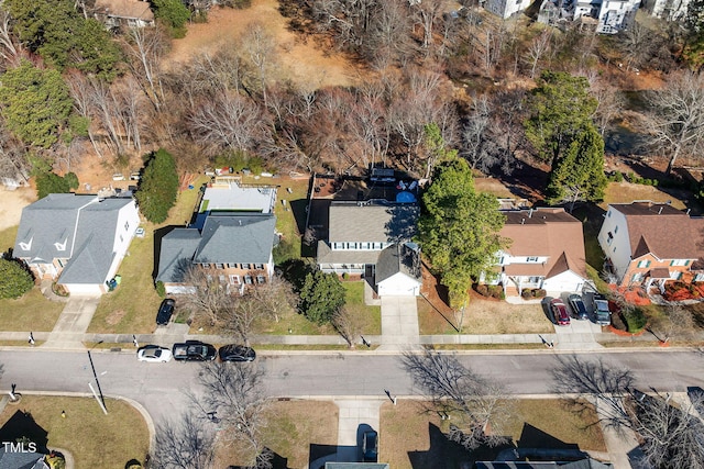 birds eye view of property with a residential view