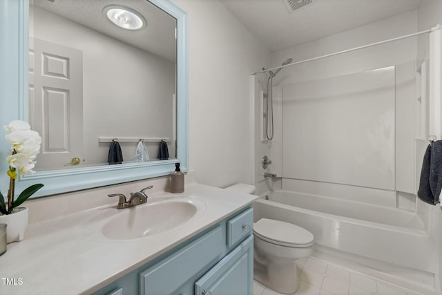 bathroom with shower / bathtub combination, a textured ceiling, toilet, vanity, and tile patterned floors