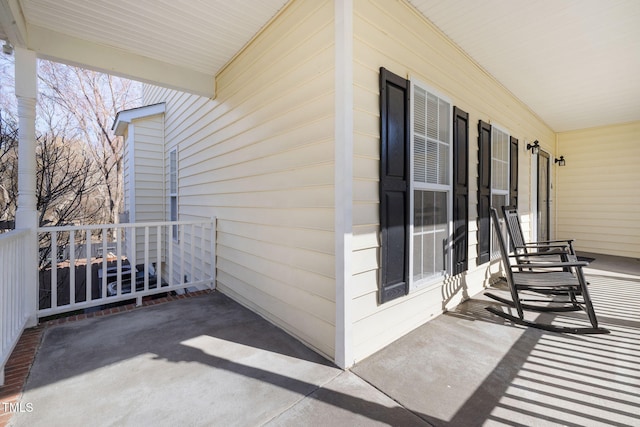 view of patio featuring a porch