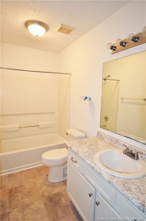 bathroom with bathing tub / shower combination, visible vents, toilet, a textured ceiling, and vanity