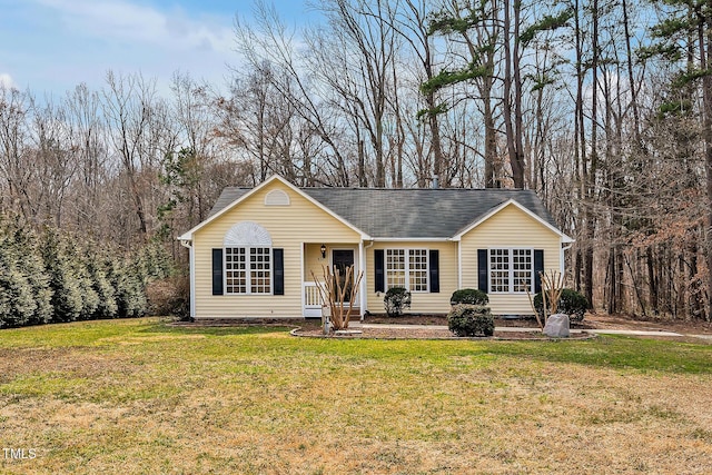 ranch-style house featuring a front lawn