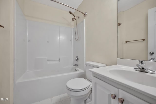 bathroom featuring toilet, tile patterned flooring, washtub / shower combination, and vanity