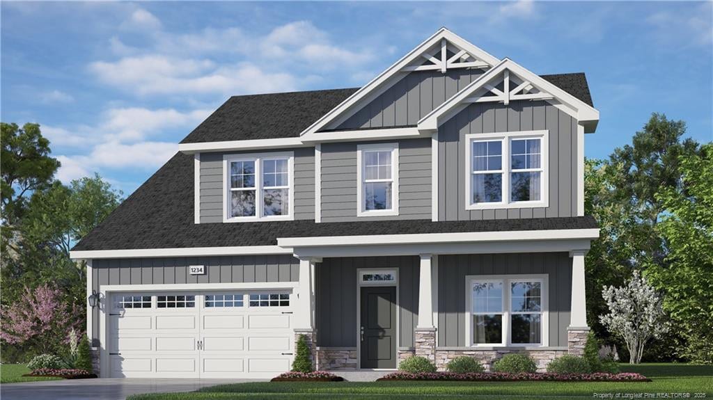 craftsman inspired home with driveway, stone siding, roof with shingles, board and batten siding, and a garage
