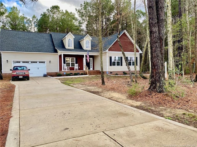 view of front of home featuring crawl space, covered porch, an attached garage, and concrete driveway