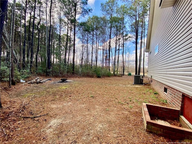 view of yard featuring central AC unit