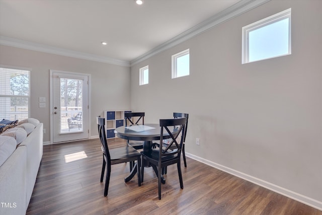 dining area featuring baseboards, ornamental molding, dark wood-style flooring, and recessed lighting