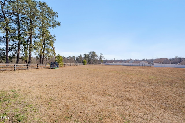 view of yard with fence