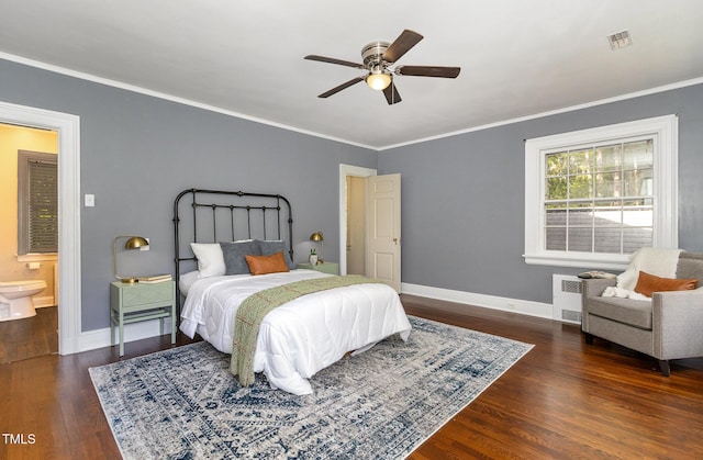 bedroom featuring ornamental molding, radiator, visible vents, and wood finished floors