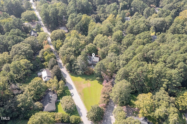 bird's eye view featuring a view of trees