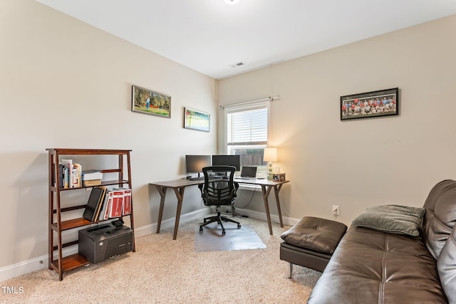 office area with carpet floors, visible vents, and baseboards