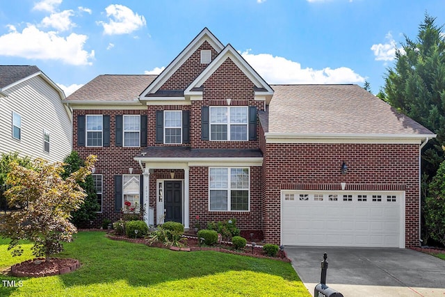 view of front of home with brick siding, a shingled roof, a garage, driveway, and a front lawn