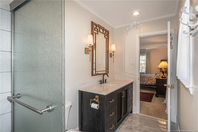 ensuite bathroom with vanity, ensuite bath, crown molding, and toilet