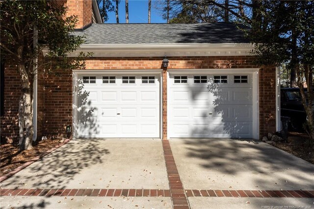 garage with driveway