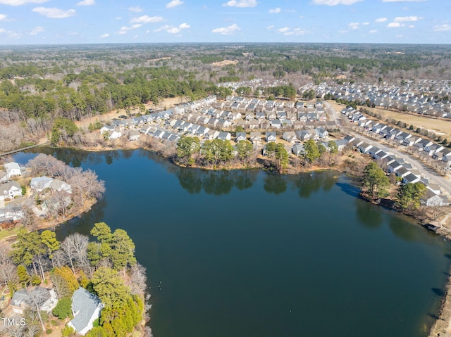 drone / aerial view with a residential view and a water view