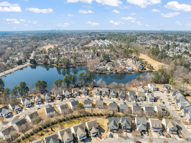 aerial view with a residential view and a water view