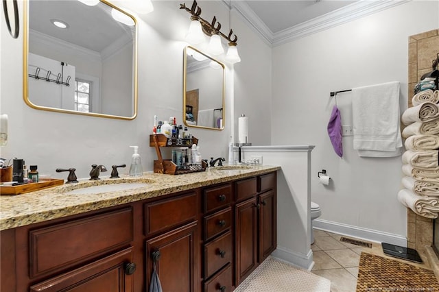 bathroom with crown molding, visible vents, toilet, a sink, and tile patterned floors