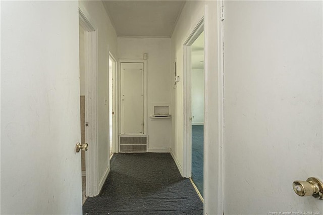 hall with carpet flooring