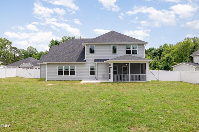 back of property featuring a sunroom, a patio, and roof with shingles