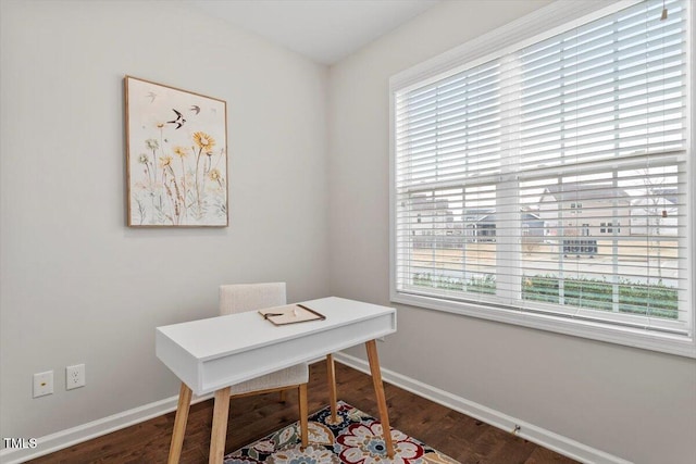 office space featuring baseboards and dark wood-style flooring