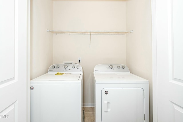 laundry area featuring laundry area and washer and dryer