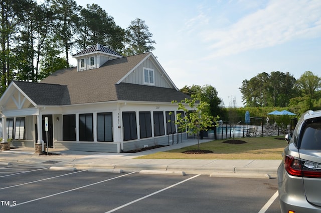 exterior space featuring fence and a fenced in pool