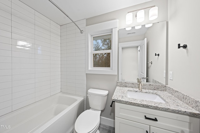 full bath with bathing tub / shower combination, visible vents, toilet, vanity, and baseboards