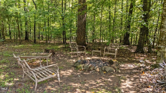 exterior space with a forest view