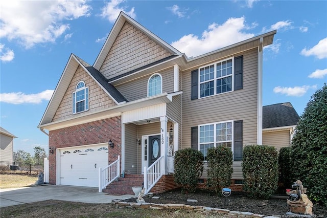 view of front facade featuring a garage, driveway, crawl space, and fence