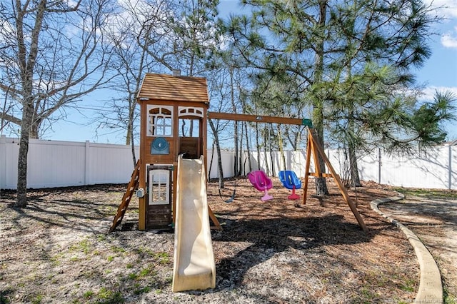 view of jungle gym featuring a fenced backyard